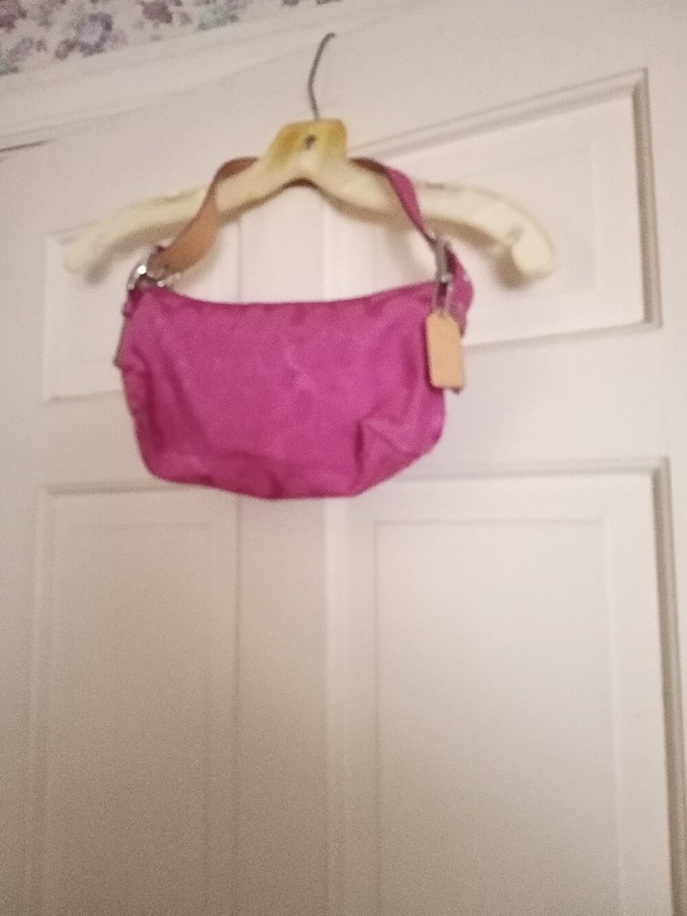 Coach Pink Signature Cs bag with logo tag top zip small